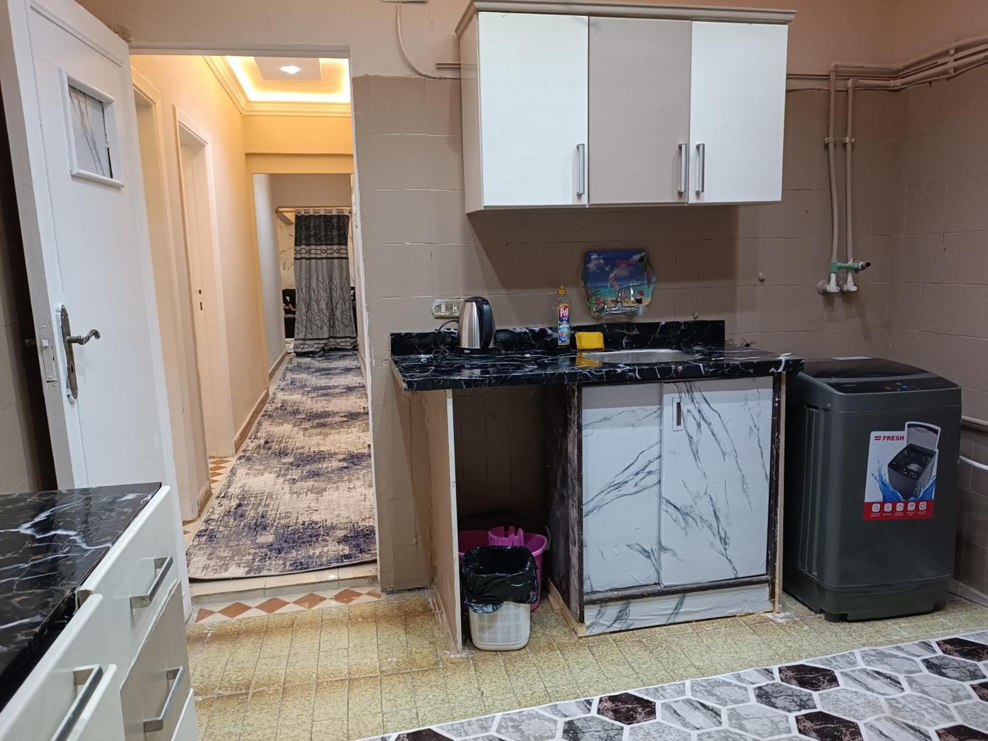 شقه مفروشه للايجار متفرع من أحمد فخري Apartment